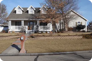 Frontier Electric LLC service trucks parked outside commercial building in Moundridge Kansas